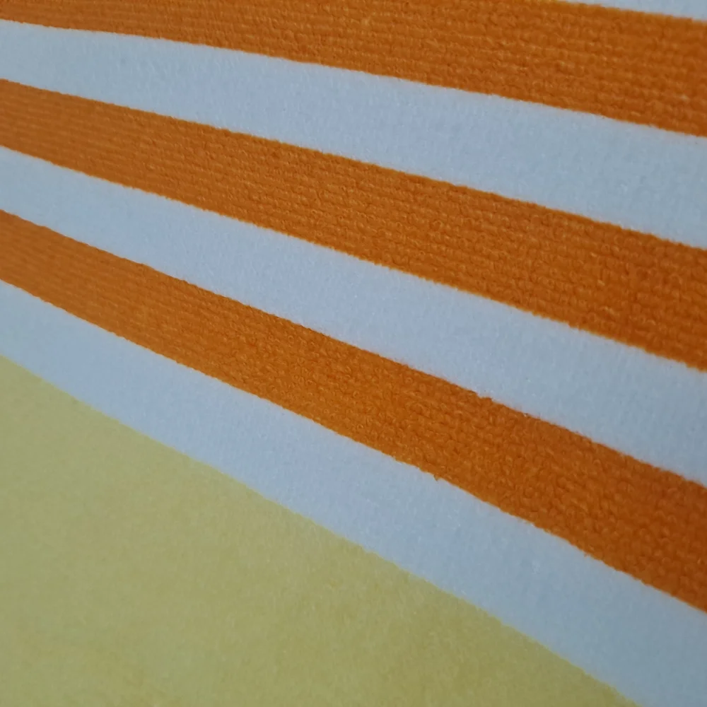 Striped Orange, Yellow, and White Beach Towel & Yellow Glass Tumbler